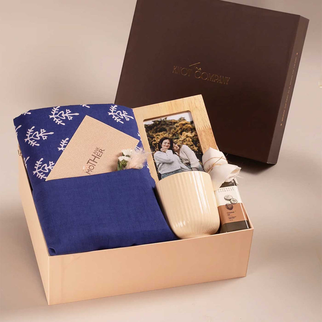 Photo Personalized For the Heart of Our Home Gift Hamper | Includes 1 Hand Block Printed Saree with Unstitched Blouse, 1 Wooden Photo Frame, 1 Ribbed & Glazed Ceramic Mug, 1 Coconut Oil, 1 Mother’s Day Handwritten Postcard, 1 Classic Gift Box