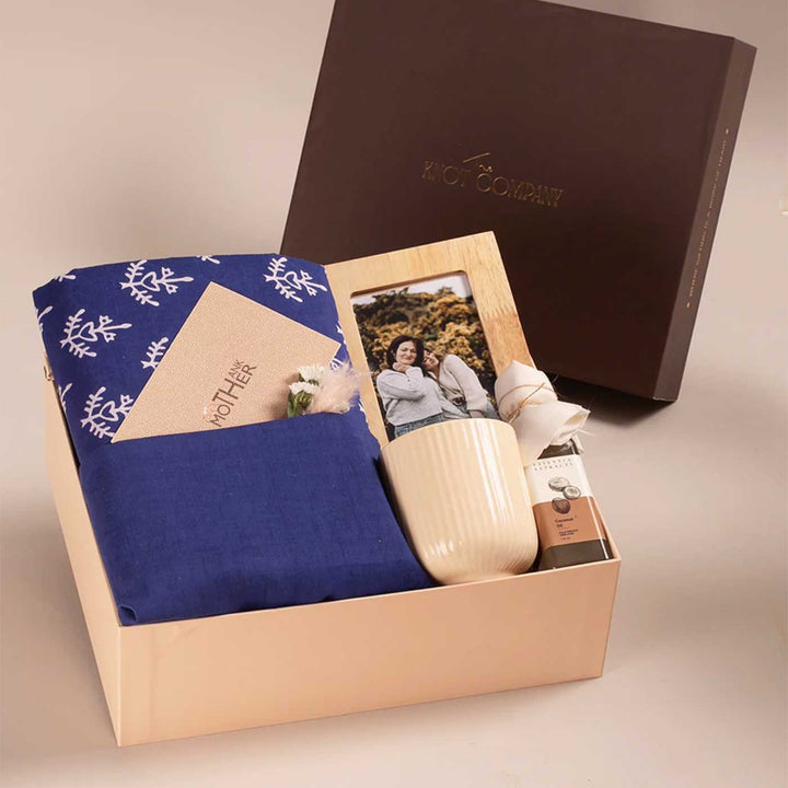 Photo Personalized For the Heart of Our Home Gift Hamper | Includes 1 Hand Block Printed Saree with Unstitched Blouse, 1 Wooden Photo Frame, 1 Ribbed & Glazed Ceramic Mug, 1 Coconut Oil, 1 Mother’s Day Handwritten Postcard, 1 Classic Gift Box