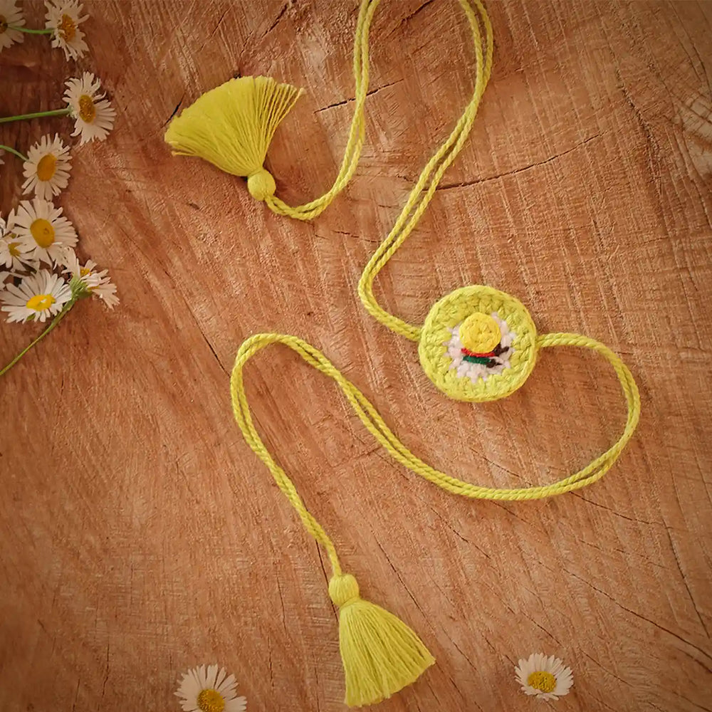Handmade Crochet Nimbumirchi Rakhi And Hanging Combo With Roli Chawal Set Of 2 - Close-up on Tassels