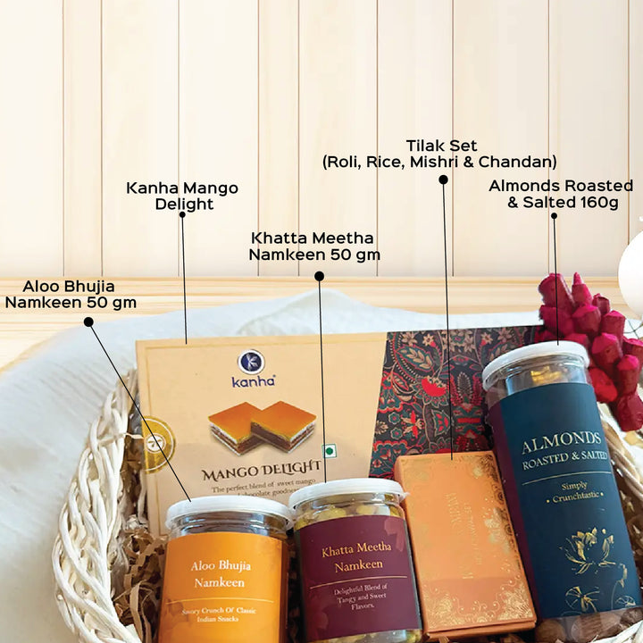 The Celebration Crate Diwali Gift Hamper | Includes 1 Mango Delight Box, 2 Namkeen Jars, 1 Almonds Jar, 1 Tilak Set, 1 Basket