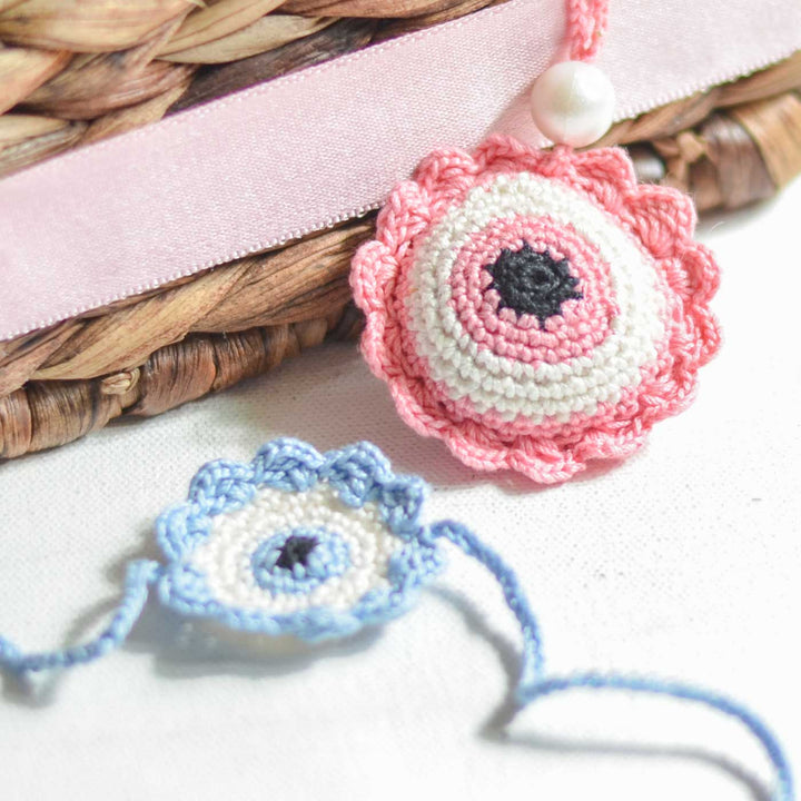 Handmade Crochet Evil Eye Design Cotton Lumba Rakhi For Bhabhi - Product Grouping and Texture Detail