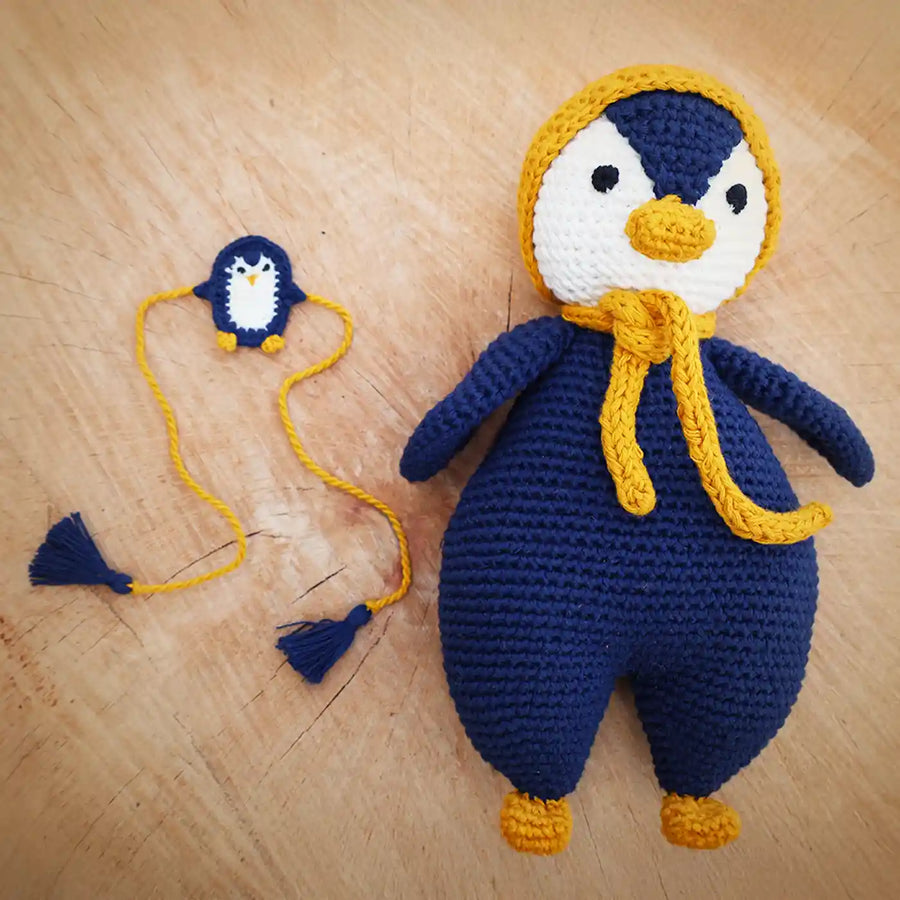 Handmade Crochet Penguin Theme Kids Rakhi And Toy Combo With Roli Chawal Set Of 2 - Front View with Small Accessory