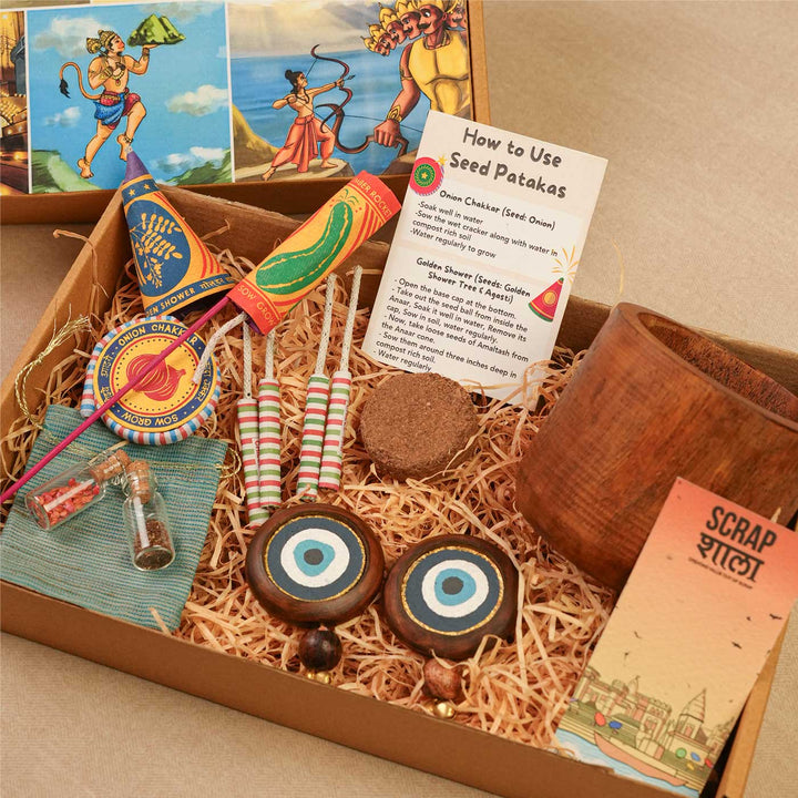 Handmade Prakriti Raksha Gift Hamper | Includes Mango Wooden Planter, Seed Crackers, Seed Jars, Cocopeat, Evil Eye Door Hanging, Cracker Instruction Card, Seed Card And Outer Box