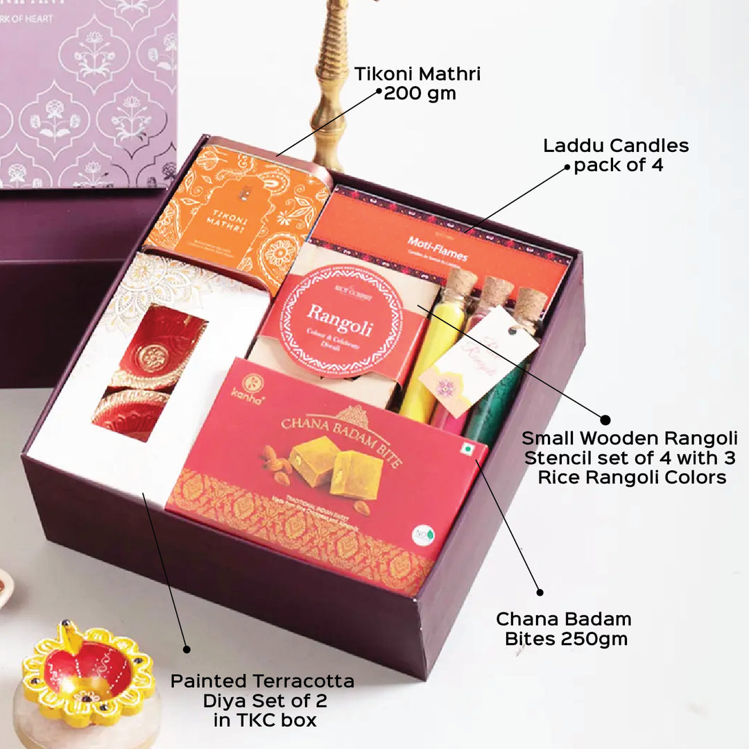 Festive Diwali Gift Hamper | Includes 2 Terracotta Diyas, 4 Rangoli Stencils, 3 Rangoli Color Tubes, 4 Ladoo Candles, 1 Chana Badam Bites, 1 Tikoni Mathri, 1 Gift Box