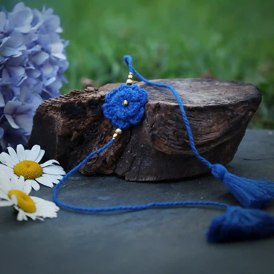 Handmade Crochet Blue Flower Rakhi With Roli Chawal - Blue Threaded Flower Close-up