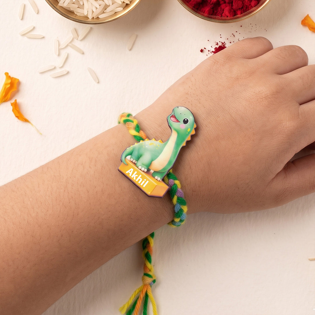 Personalized Reusable Green Dino MDF Wood Rakhi With Roli Chawal