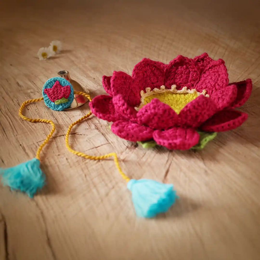 Handmade Crochet Lotus Rakhi And Tealight Holder Combo With Roli Chawal Set Of 2 - Side Angle Showing Flower and String