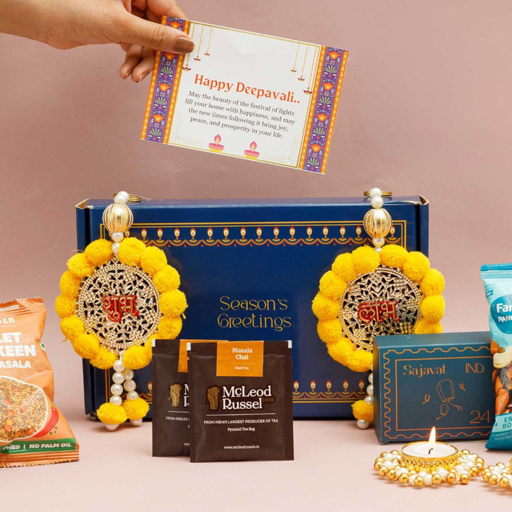 Handmade Prakash Gift Hamper | Includes 2 Tea Sachets, 2 Tea Light Holder, 2 Snacks, 1 Sajavat Shubh Labh, 1 Festive Card And 1 Box