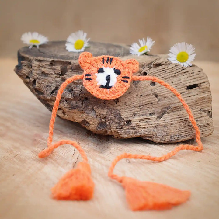 Handmade Crochet Tiger Theme Kids Rakhi And Toy Combo With Roli Chawal Set Of 2 - Close-up of Headband Accessory