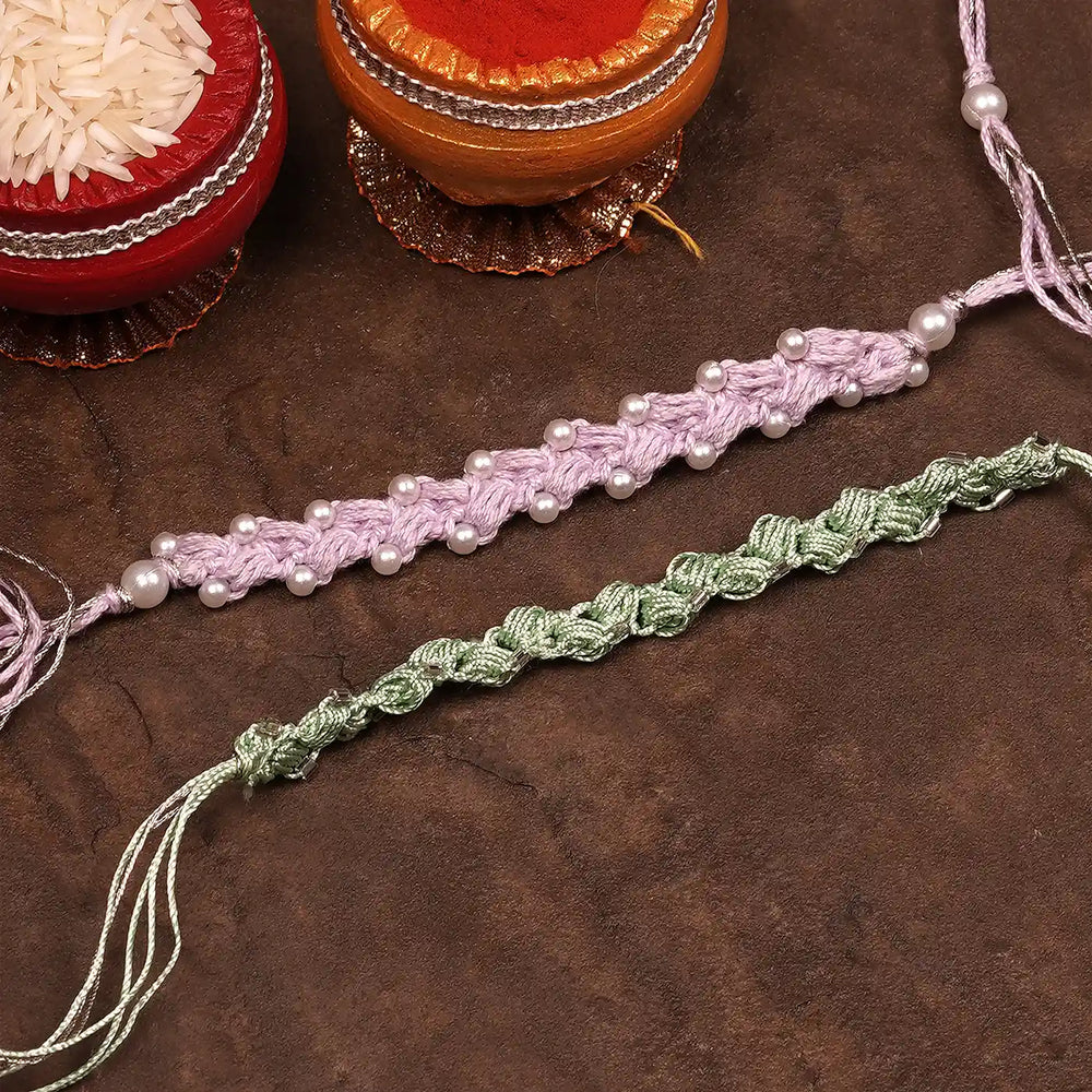 Handmade Crochet Beaded Rakhi With Roli Chawal Set Of 2 - Two Bracelets with Ritual Items