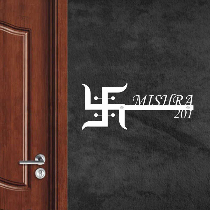 Personalized Swastik Laser Cut Metal Name Plate - Wall-mounted personalization example