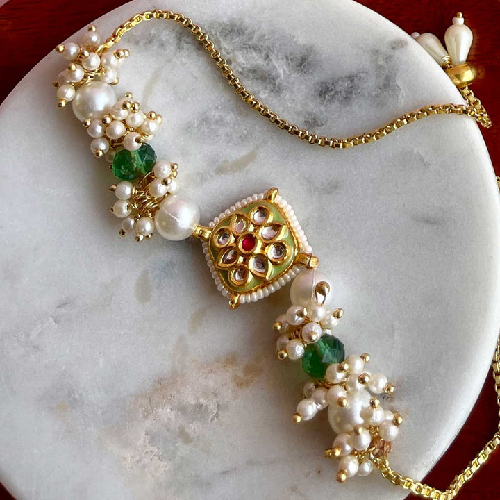 Handmade Golden Flower Design Metal Bhaiya Bhabhi Rakhi - Close-up of Pendant Features