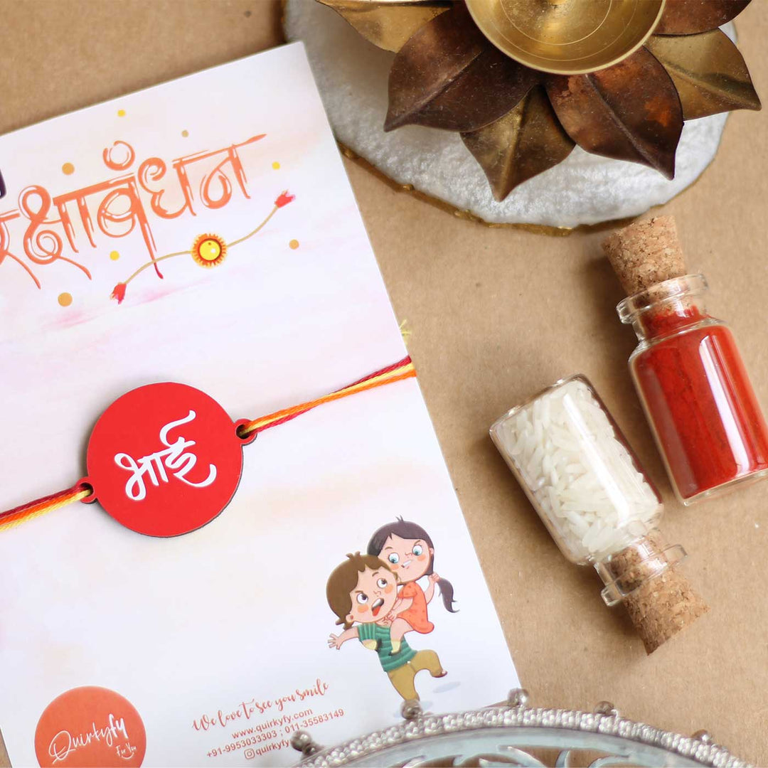 My Super Duper Ideas Rakhi Hamper For Brother Includes 1 Rakhi 1 Dairy 1 Pen And 1 Chocolate - Rakhi Card with Traditional Items