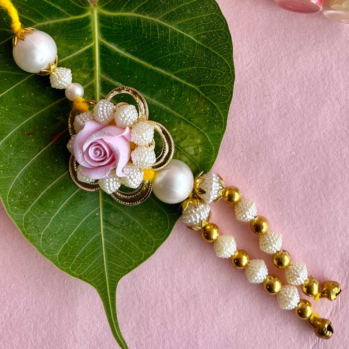 Handmade Purple Flower Design Pearl And Stone Bhaiya Bhabhi Rakhi - Close-up of Tassel End Details