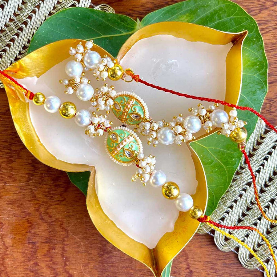Handmade Green Oval Design Pearl And Stone Bhaiya Bhabhi Rakhi - Close-up Front View