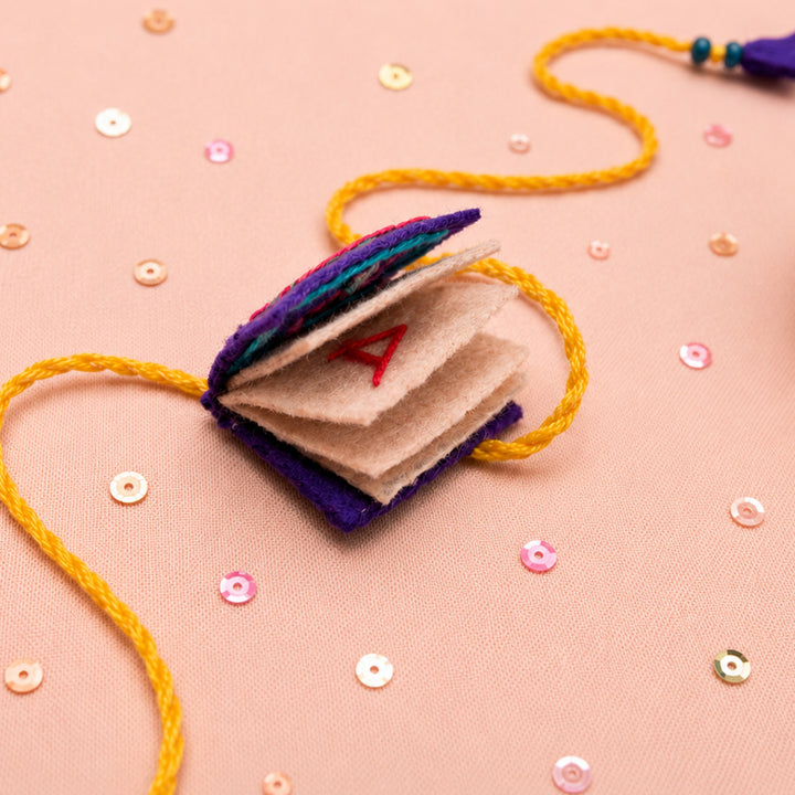 Hand Embroidered Book Rakhi With Keychain For Brother