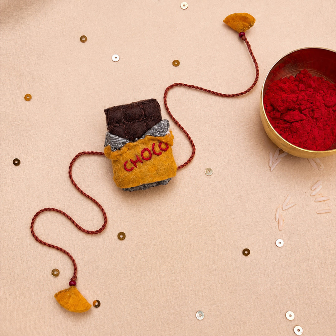 Hand Embroidered Chocolate Rakhi With Magnet For Brother