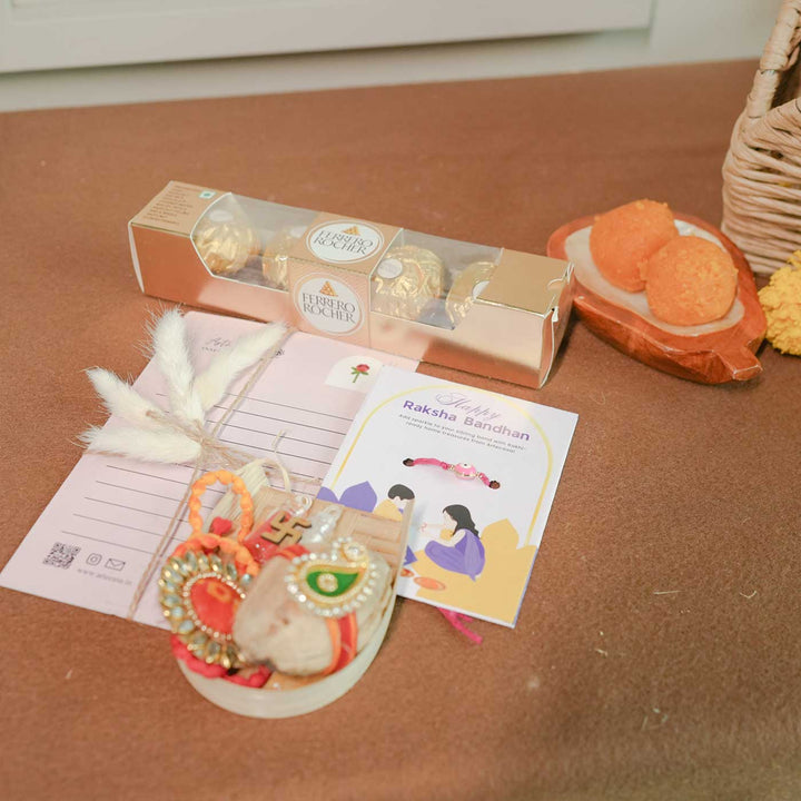 Personalized Handmade Foodie Theme Rakhi Hamper Includes 1 Basket 1 Plate 1 Mug 1 Rakhis 1 Roli Chawal 1 Chocolate And 1 Message Card - Individual Gift Items Layout