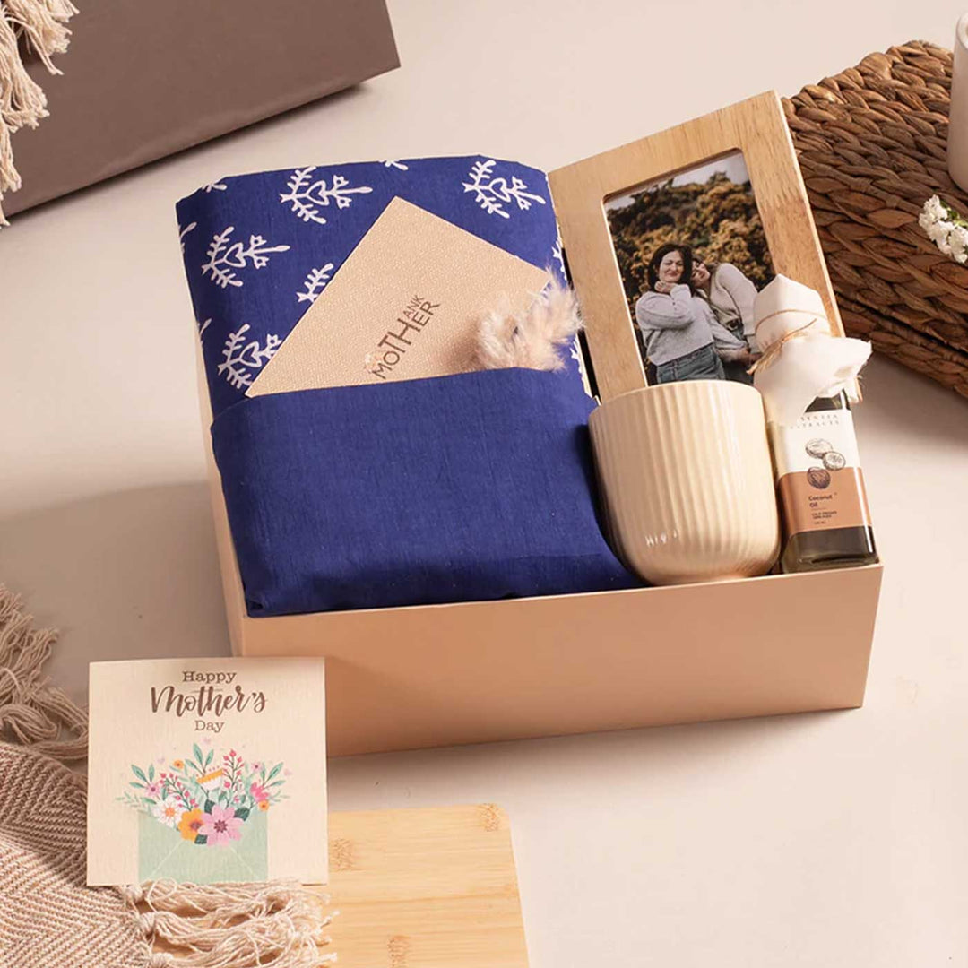 Photo Personalized For the Heart of Our Home Gift Hamper | Includes 1 Hand Block Printed Saree with Unstitched Blouse, 1 Wooden Photo Frame, 1 Ribbed & Glazed Ceramic Mug, 1 Coconut Oil, 1 Mother’s Day Handwritten Postcard, 1 Classic Gift Box