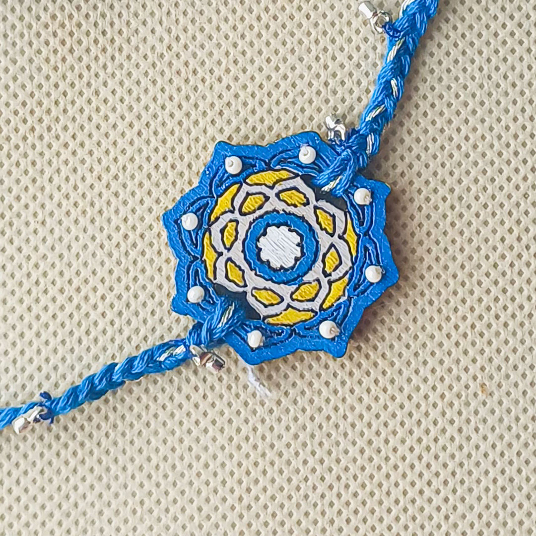 Handmade Blue Jaipuri Ghungroo And Shell Beads Wooden Lumba Rakhi For Bhabhi With Roli Chawal - Close-up of Necklace Pendant