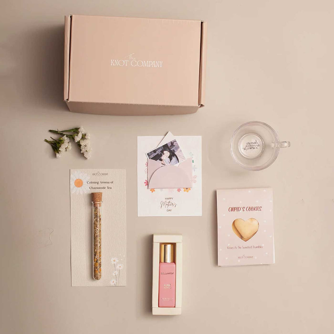 Photo Personalized Celebrating Mom’s Love Gift Hamper | Includes 1 Perfume, 4 Heart-Shaped Baked Cookies, 1 “Love You Mom” Glass Tea Cup, 1 Mother’s Day Card, 1 Chamomile Tea Glass Tube, 1 All Things Nice Gift Box