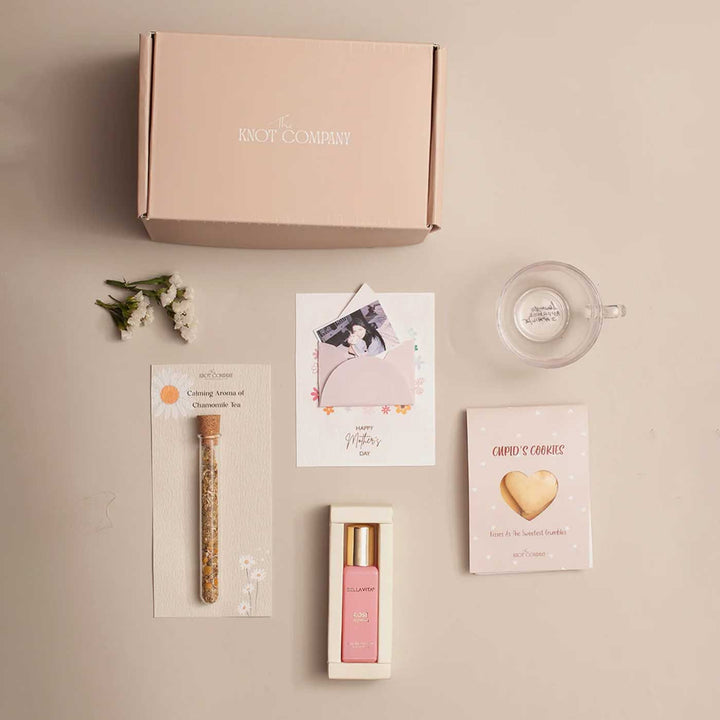 Photo Personalized Celebrating Mom’s Love Gift Hamper | Includes 1 Perfume, 4 Heart-Shaped Baked Cookies, 1 “Love You Mom” Glass Tea Cup, 1 Mother’s Day Card, 1 Chamomile Tea Glass Tube, 1 All Things Nice Gift Box