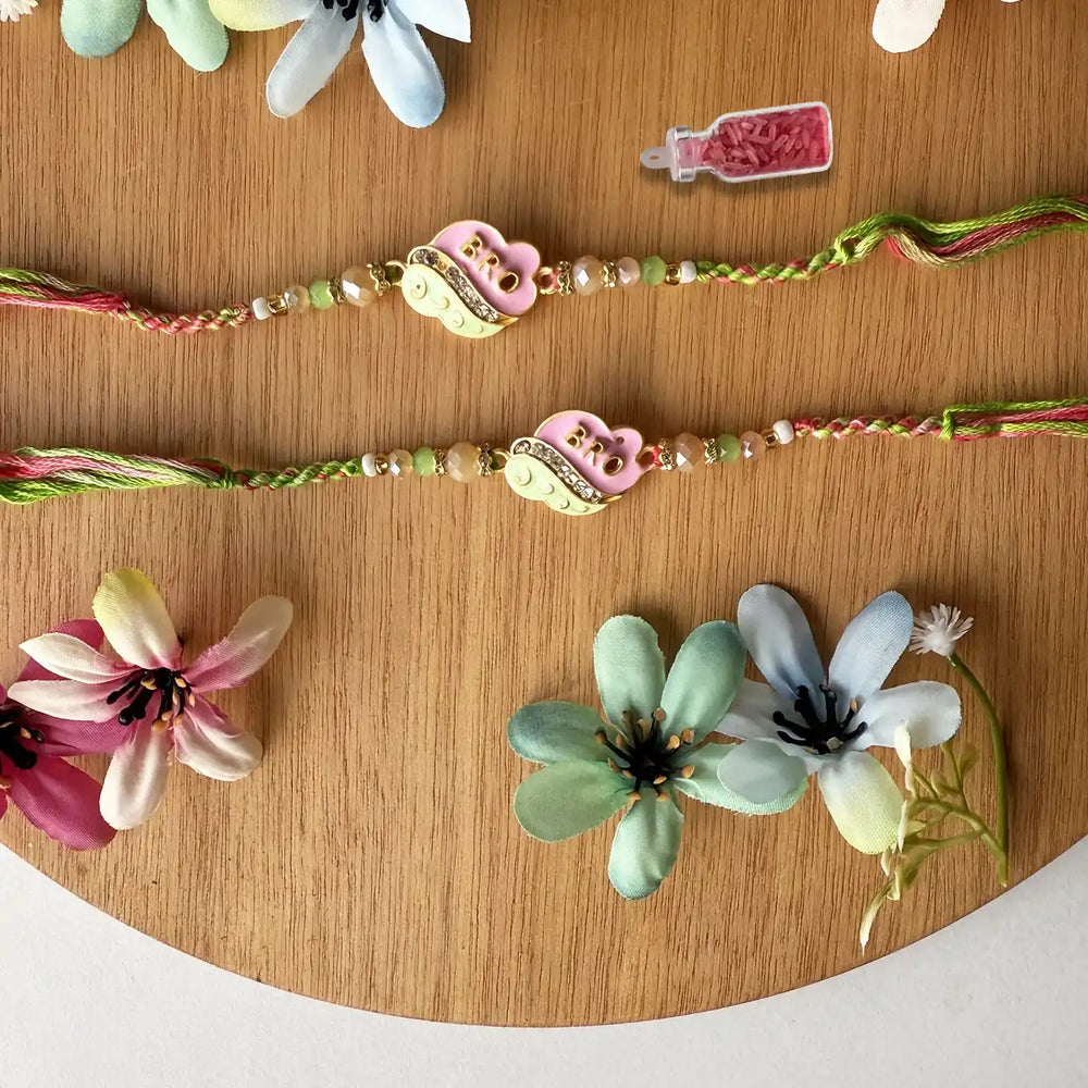 Handmade Pink And Green Beaded Bro Rakhi With Roli Chawal - Front View with Decoration