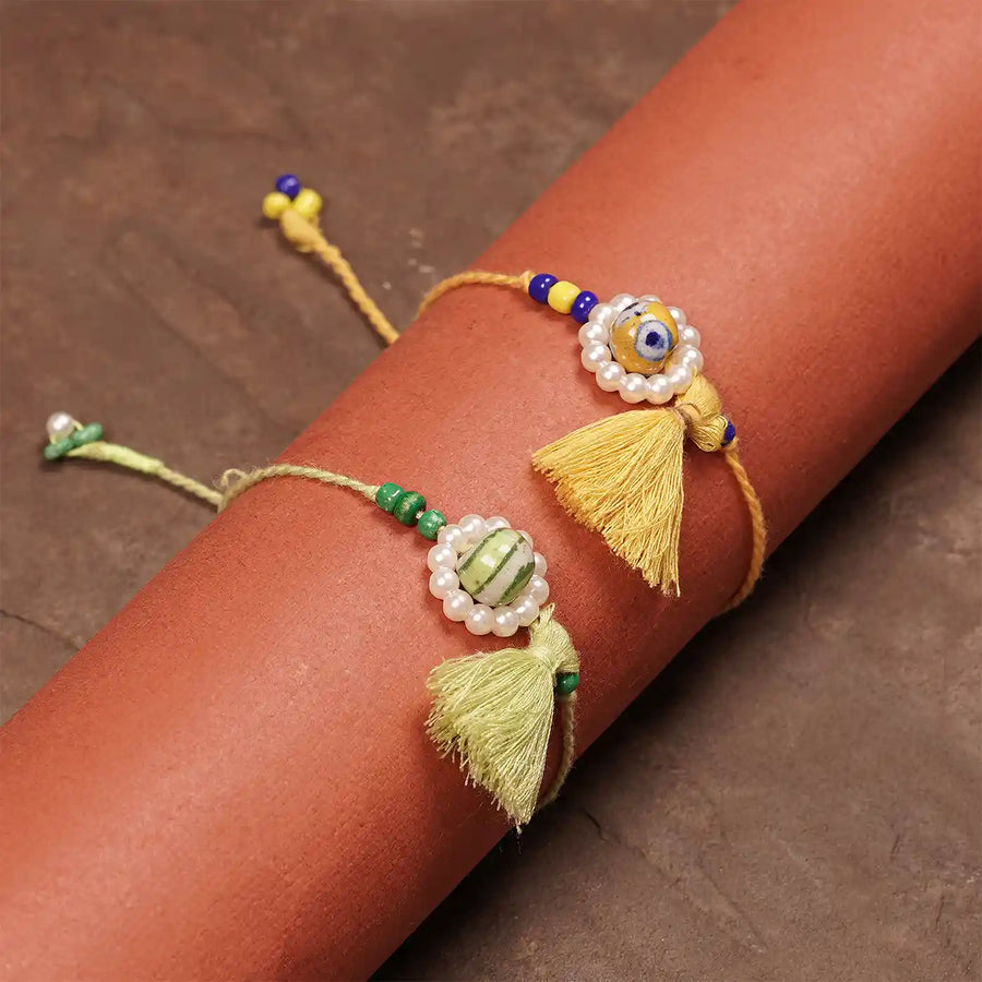 Handmade Blue Pottery Bead With Tassel Rakhi With Roli Chawal Set Of 2 - Worn on Arm Display