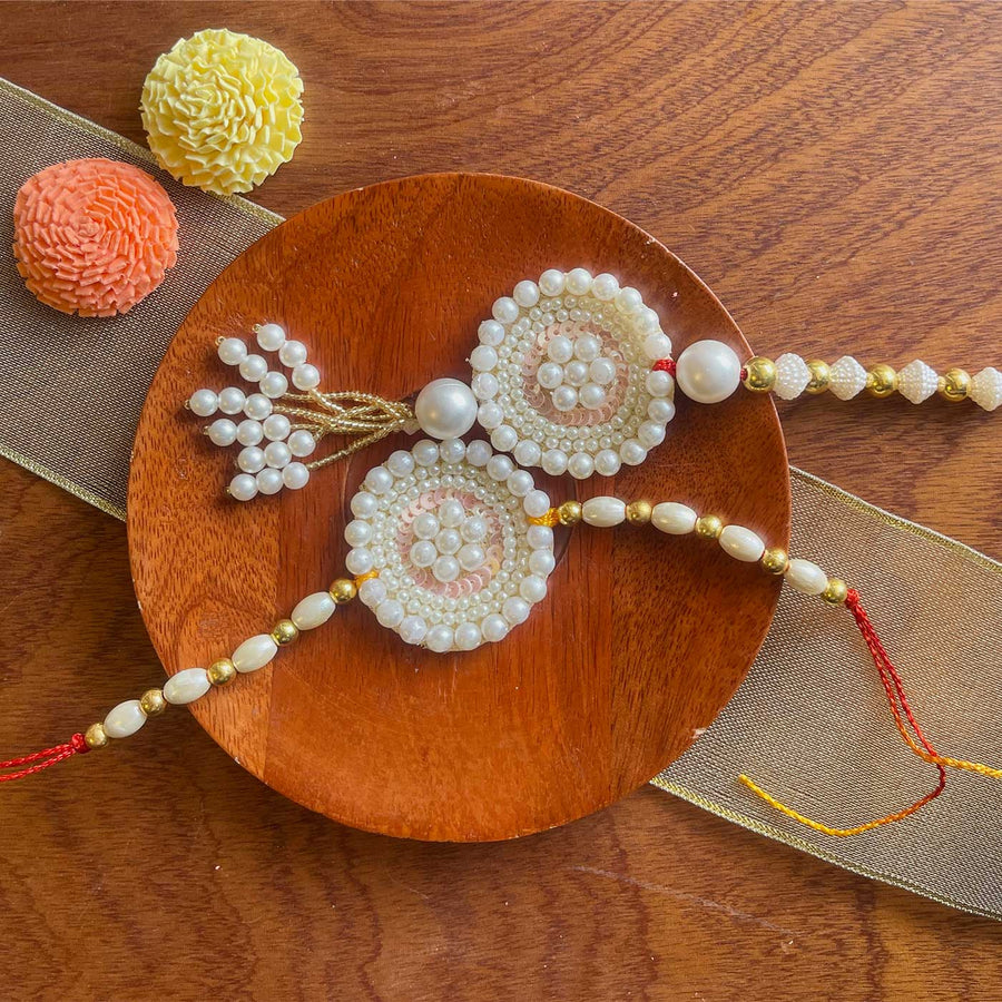 Handmade White Flower Design Pearl And Stone Bhaiya Bhabhi Rakhi - Full Product Display