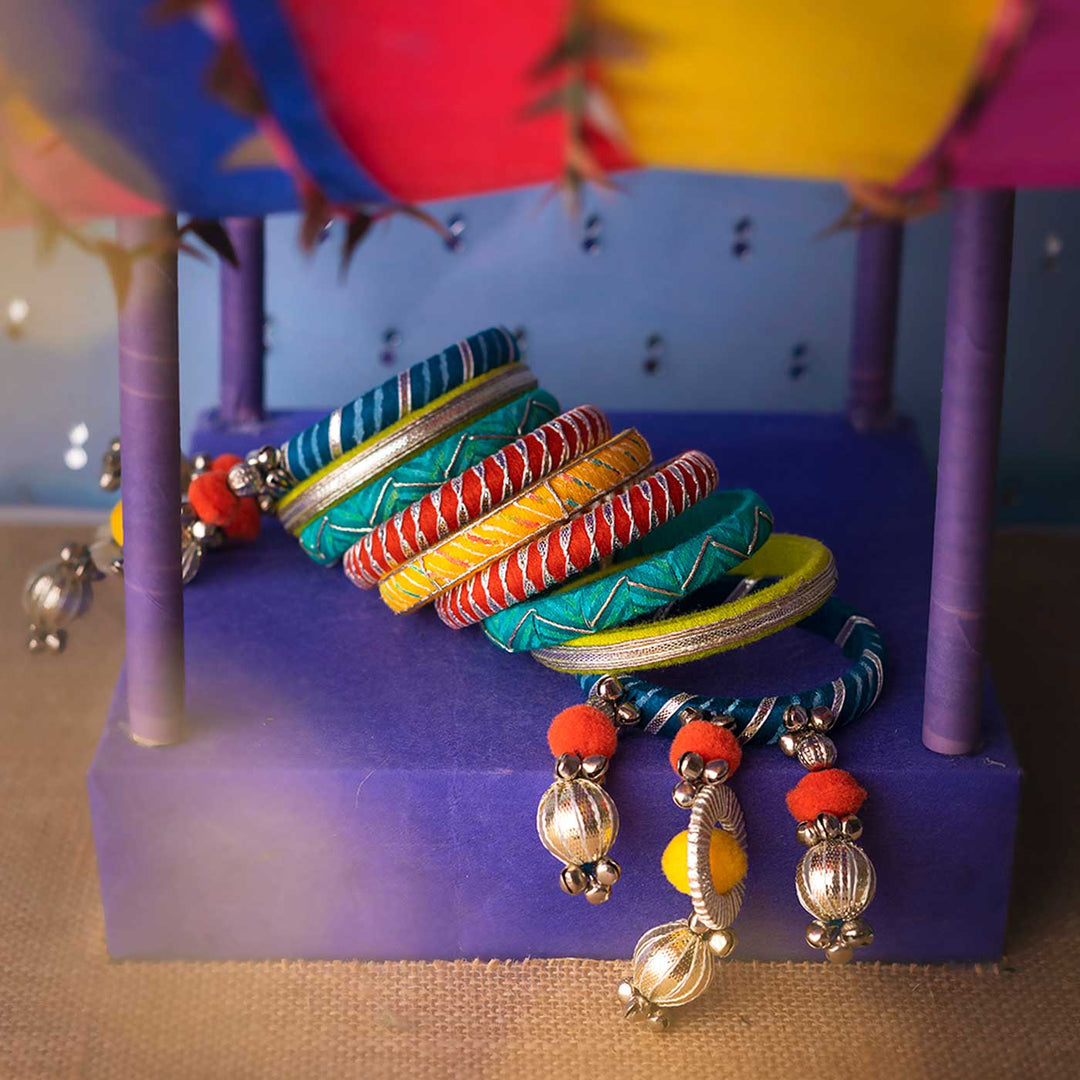 Multicolour Handcrafted Urvi Gotapatti with Pompom Ghugharu Bangles | Set of 9