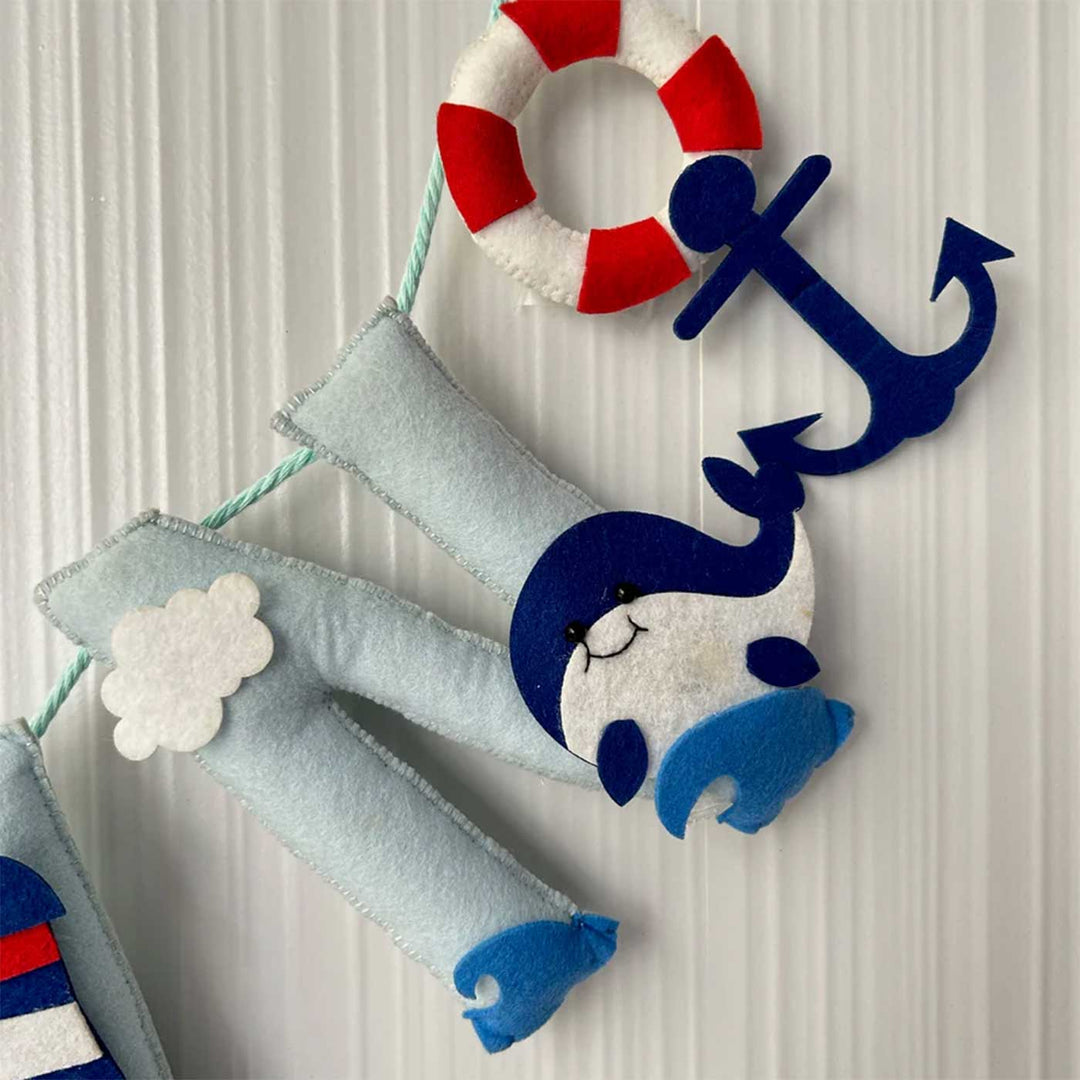 Personalized Nautical Felt Bunting Garland For Kids - Close-up of Hanging Nautical Decoration