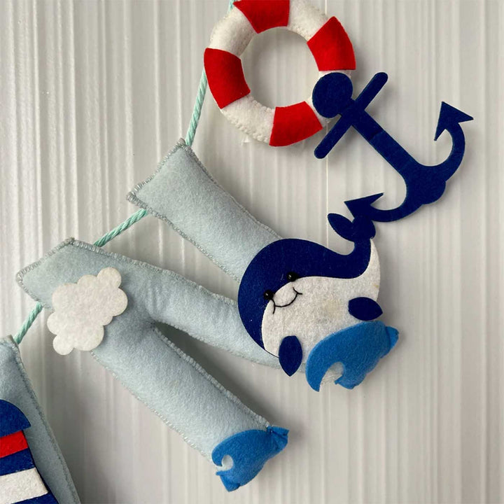Personalized Nautical Felt Bunting Garland For Kids - Close-up of Hanging Nautical Decoration