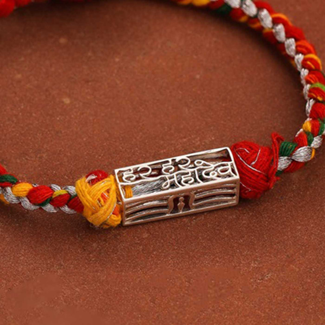 Handmade Har Har Mahadev Design Religious Silver Rakhi For Brother - Close-up of Rakhi metal charm