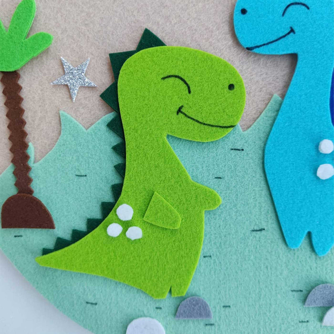 Personalized Handmade Dino Theme Felt Hoop Name Plate - Close-up of Felt Dinosaur Detail