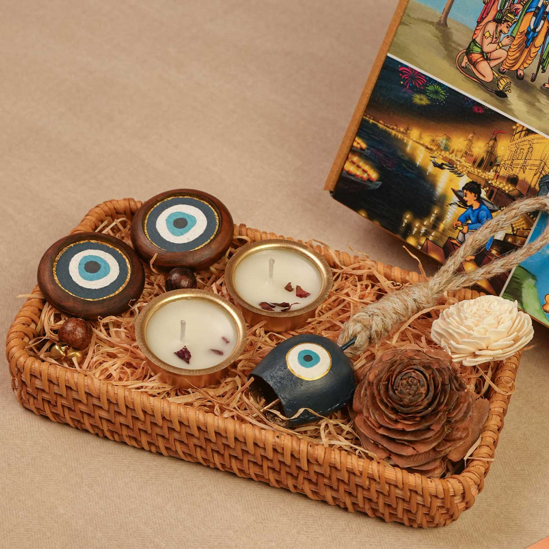 Handmade Nazar Jyoti Gift Hamper | Includes Evil Eye Door Hanging, Evil Eye Bell Hanging, Gold Soy Wax Candles, Seed Card And Outer Box
