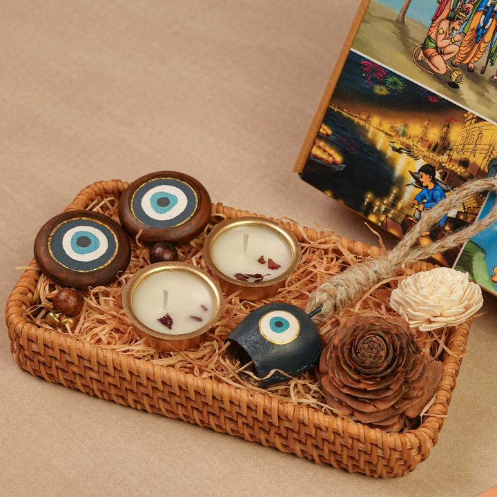 Handmade Nazar Jyoti Gift Hamper | Includes Evil Eye Door Hanging, Evil Eye Bell Hanging, Gold Soy Wax Candles, Seed Card And Outer Box