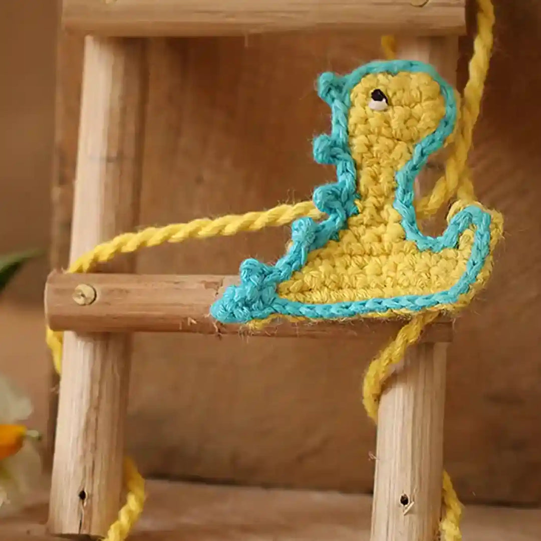 Handmade Crochet Baby Dragon Theme Kids Rakhi And Toy Combo With Roli Chawal Set Of 2 - Ladder Accessory Detail Close-up