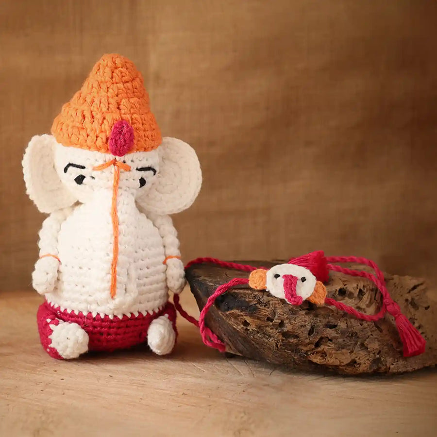 Handmade Crochet Ganesha Theme Kids Rakhi And Toy Combo With Roli Chawal Set Of 2 - Crochet toy with bracelet