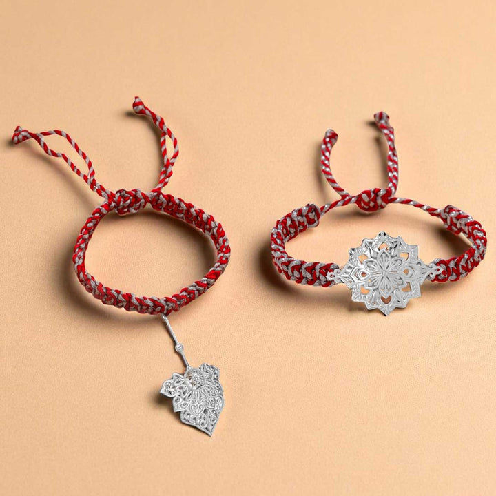 Handmade Fligree Design Silver Bhaiya Bhabhi Rakhi - Flat lay of two bracelets