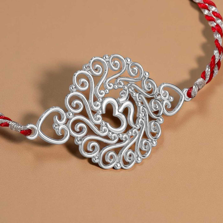 Handmade Om Design Religious Silver Rakhi For Brother - Engraving Close-up