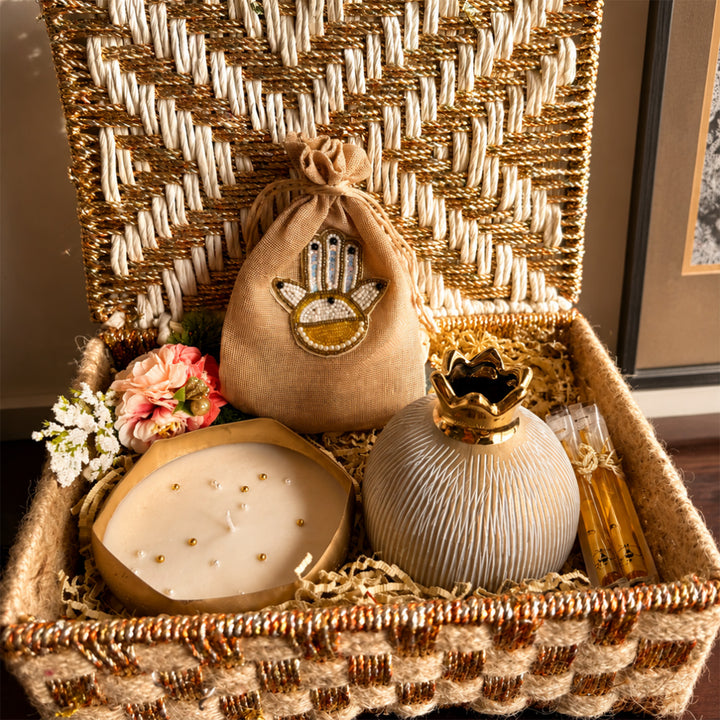 Swarn Utsav White & Gold Basket Diwali Gift Hamper With Urli Candle, Shubh Labh Potli And Pomegranate Vase For Festive Gifting