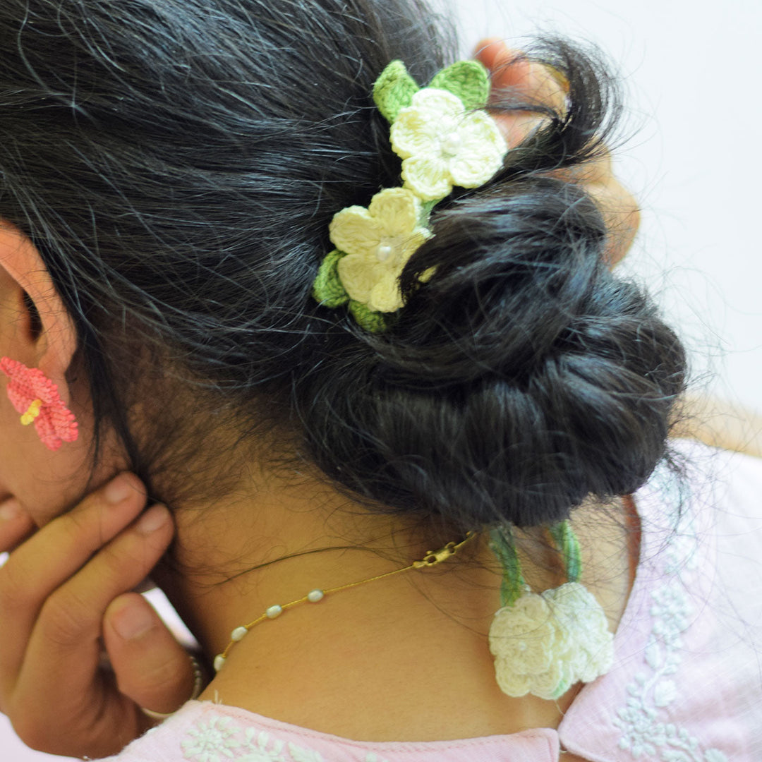 Handmade Reusable White Floral Bliss Bhaiya Bhabhi Rakhi With Roli Chawal - Hair Accessory Worn View
