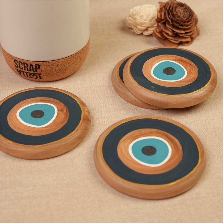 Handmade Divya Drishti Gift Hamper | Includes Evil Eye Door Hanging, Evil Eye Coasters, Evil Eye Candle Stand, Evil Eye Bell Hangings, Seed Card And Outer Box
