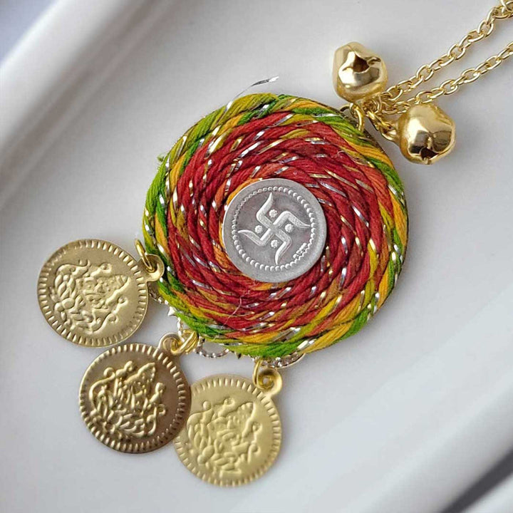 Handmade Three Swastik Silver Coin Lumba Rakhi for Bhabhi With Roli Chawal