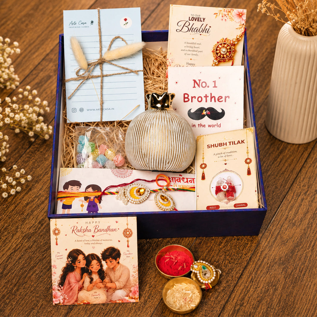 Ivory Pomegranate Porcelain Vase Rakhi Hamper With Rakhi Set For Bhaiya Bhabhi