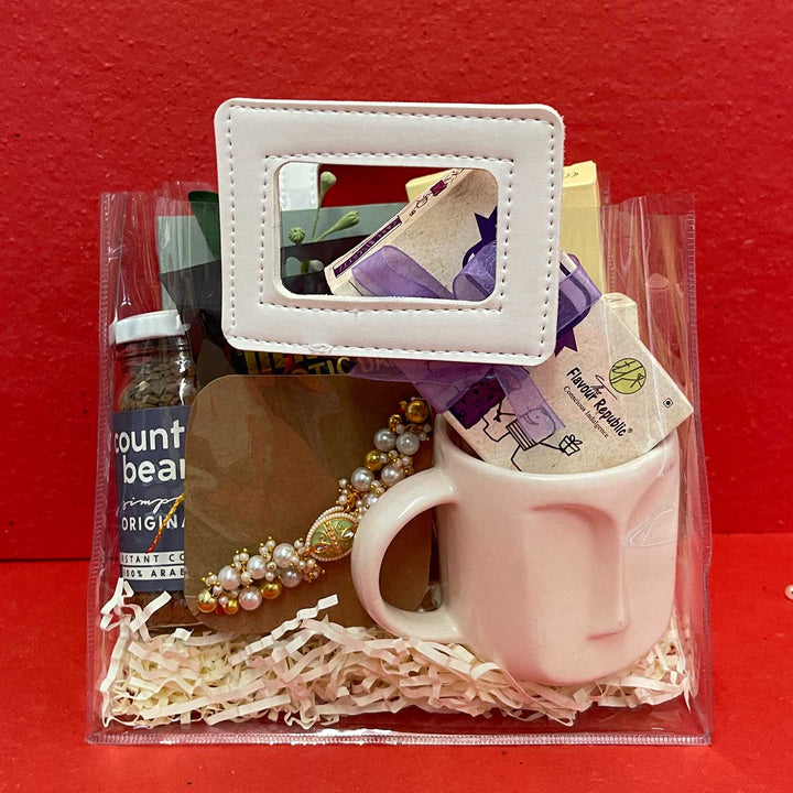 Photo Personalized Handmade Crumbs And Chaos Rakhi Hamper Includes 1 Mug 2 Biscotti 5 Photos 2 Brownies 1 Marble Lotus 1 Chocolate 1 Coffee And 1 Set Bhaiya Bhabhi Rakhi - Packed in Clear Gift Bag