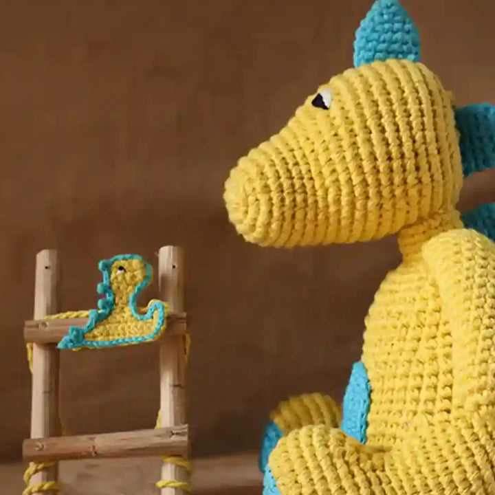 Handmade Crochet Baby Dragon Theme Kids Rakhi And Toy Combo With Roli Chawal Set Of 2 - Close-up of Dinosaur and Ladder Detail