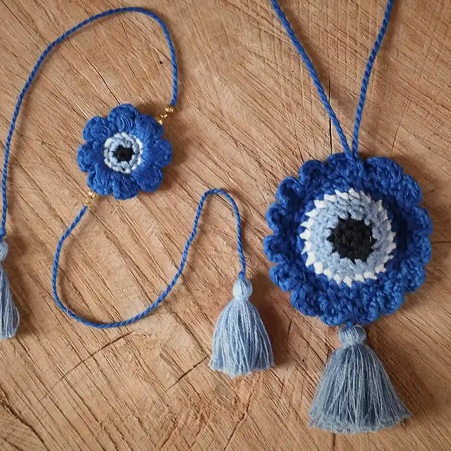 Handmade Crochet Evil Eye Rakhi And Bunting Combo With Roli Chawal Set Of 2 - Close-up of full necklace