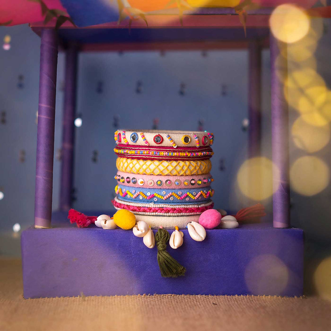 Pastel Handcrafted Navya Beaded Tassel Hanging with Shell Bangles | Set of 7