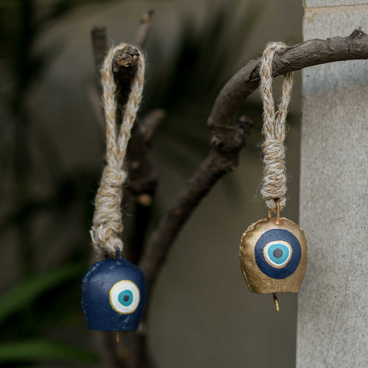 Handmade Divya Drishti Gift Hamper | Includes Evil Eye Door Hanging, Evil Eye Coasters, Evil Eye Candle Stand, Evil Eye Bell Hangings, Seed Card And Outer Box